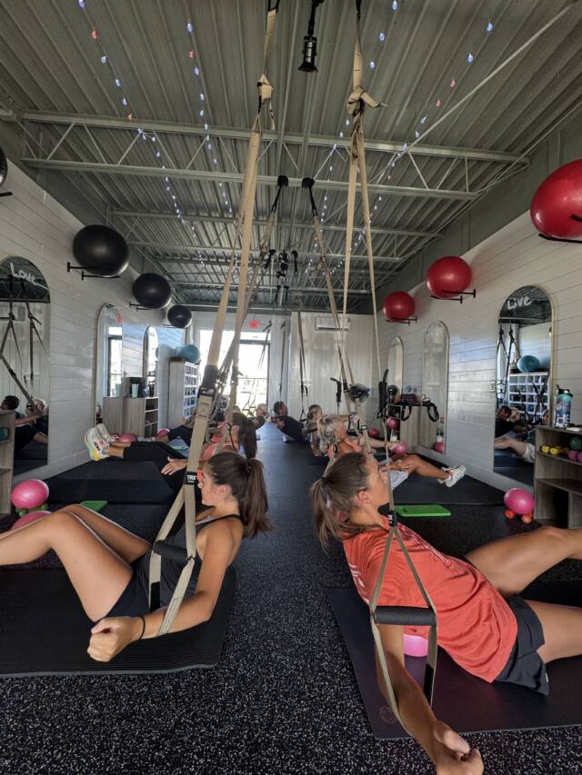 Students taking a TRX Pilates Class at Studio 8 Wellness Center Students taking a TRX Pilates Class at Studio 8 Wellness Center