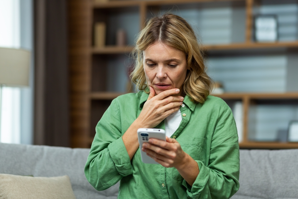 Midlife woman reflecting on cognitive changes